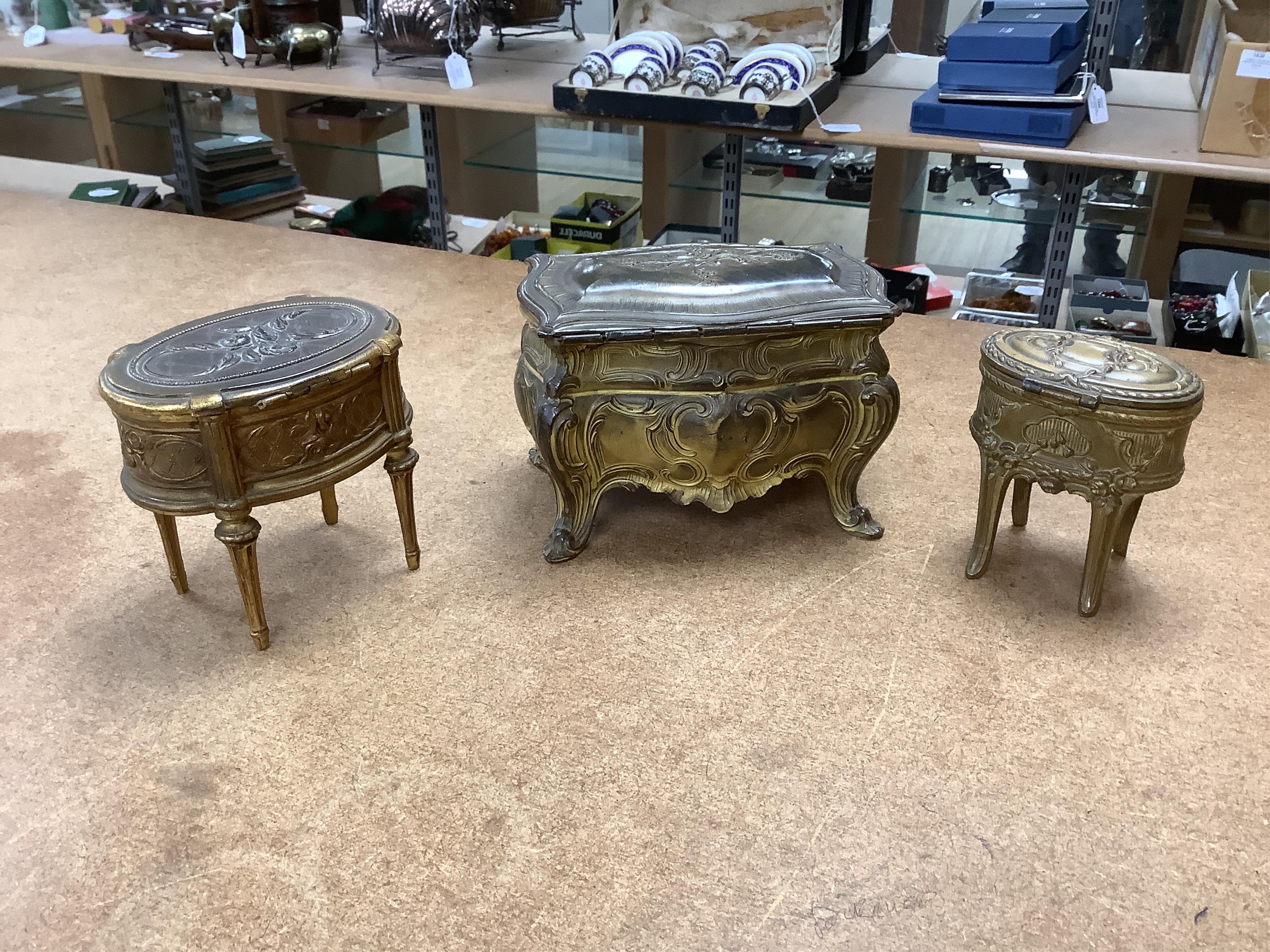 Three French gilt metal miniature novelty jewellery caskets modelled as various items of furniture, largest 14cm wide. Condition - fair to good